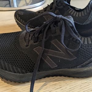 Black New Balance running shoes